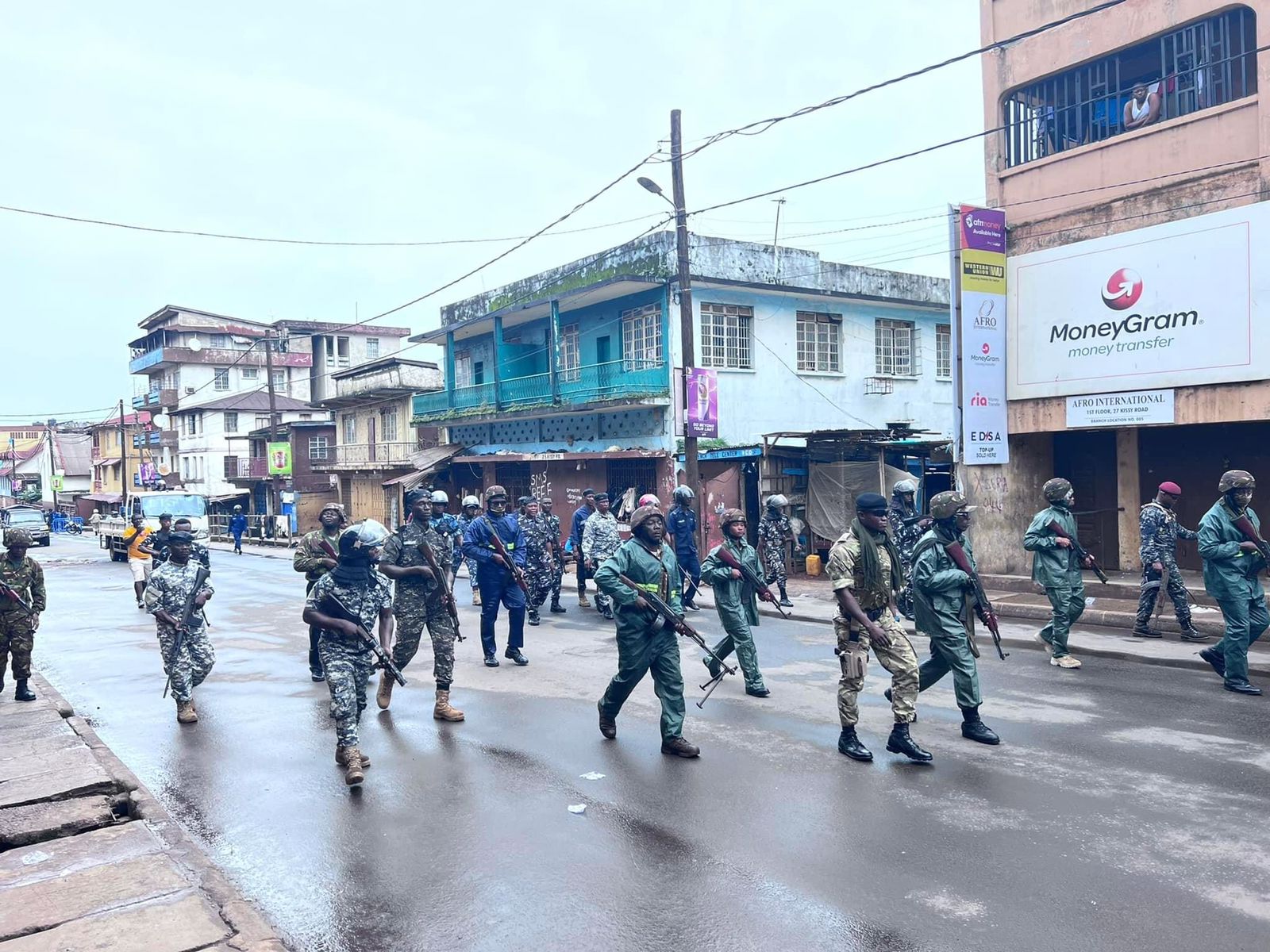 Sierra Leone Police and military are marching the street to quell protests.