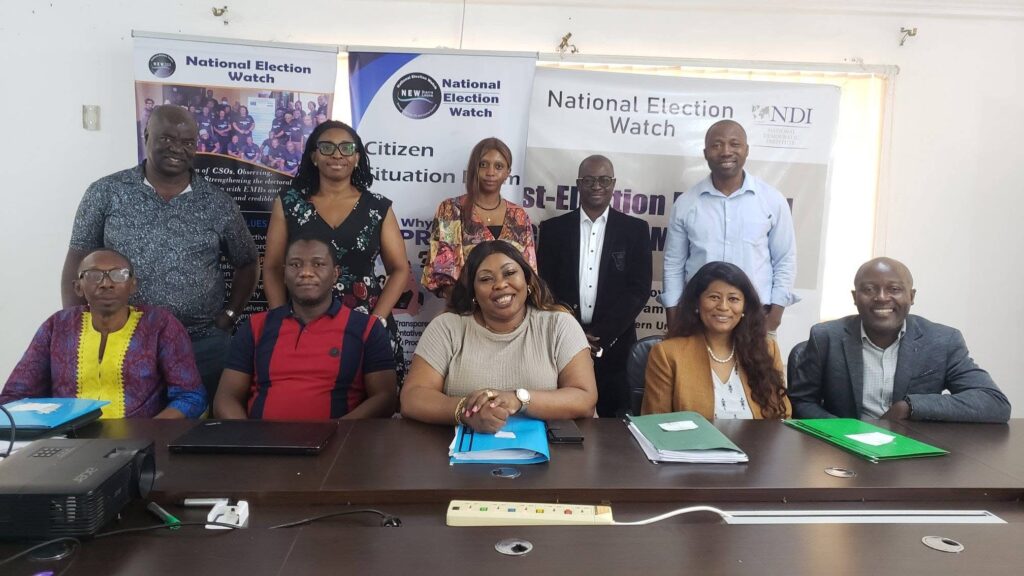 Marcella Samba-Sesay, the Chairperson of the National Elections Watch (NEW), sits in the centre, surrounded by her team. Photo Credit: National Elections Watch on Facebook.