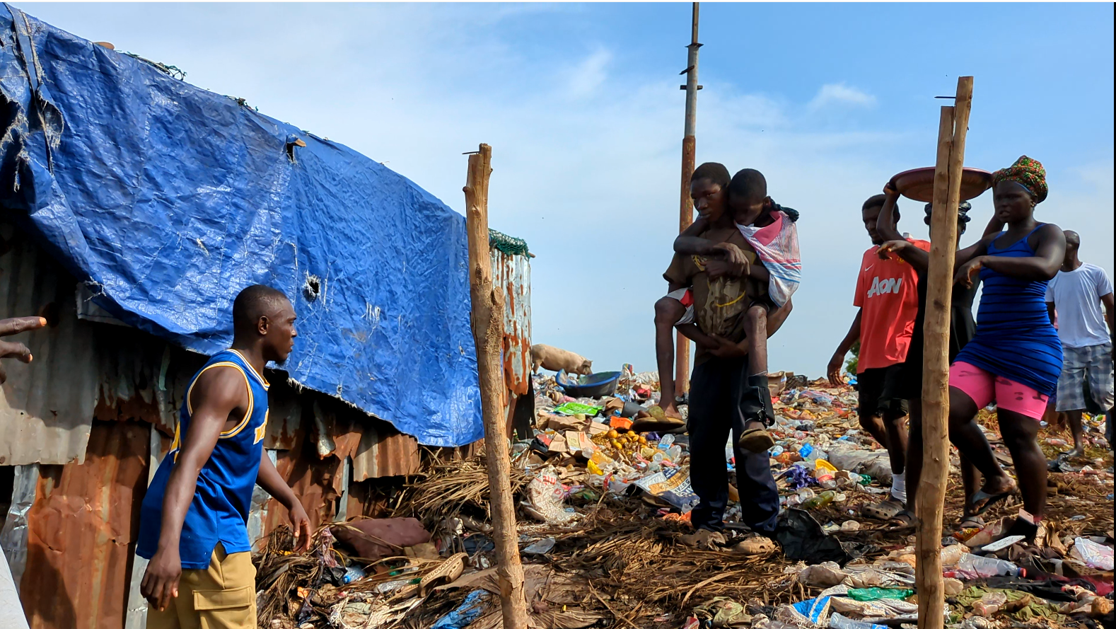 A person with a substance abuse problem was taken from his hideout in a Freetown slum for government rehabilitation service in November, 2026. Photo Credit: Kemo Cham/Engage Salone.